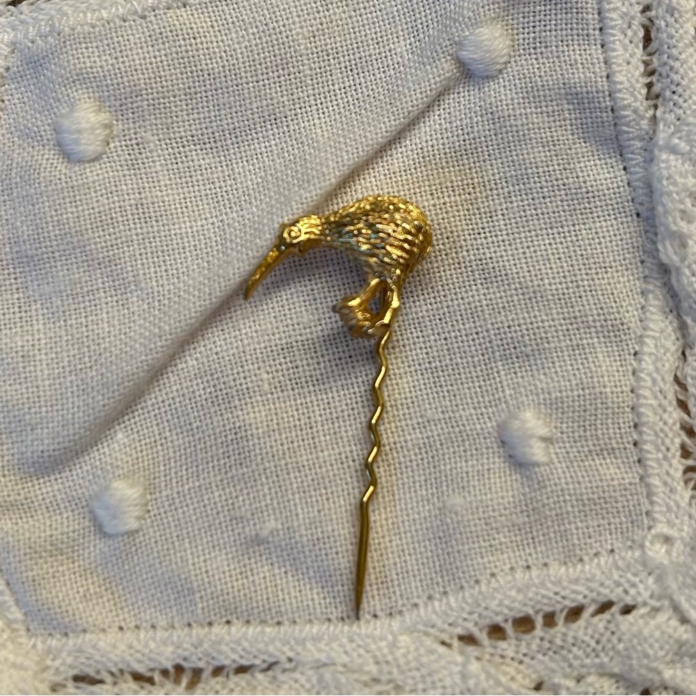Brushed gold crow pin kiwi bird